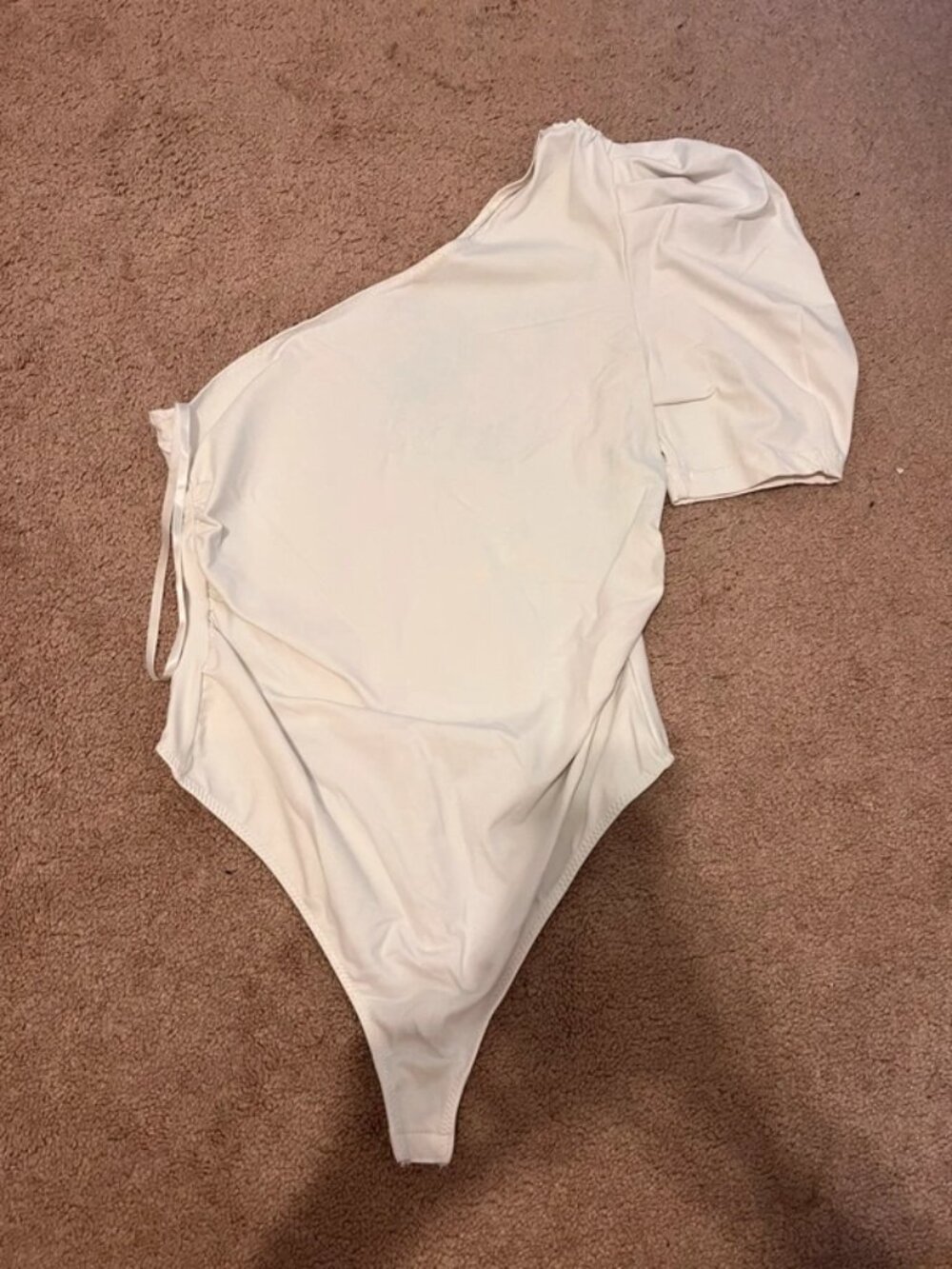 White one shoulder bodysuit with puffy sleeves